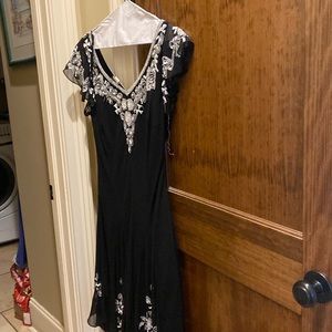 Black cocktail dress with handkerchief bottom and beaded top